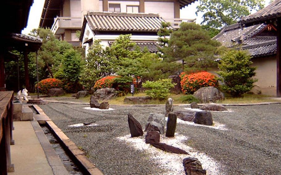 Stone gardens like this one at Kanchi-in can be seen at many temples in Kyoto. Sitting on a wooden velanda to watch the garden is truly a moment of meditation.