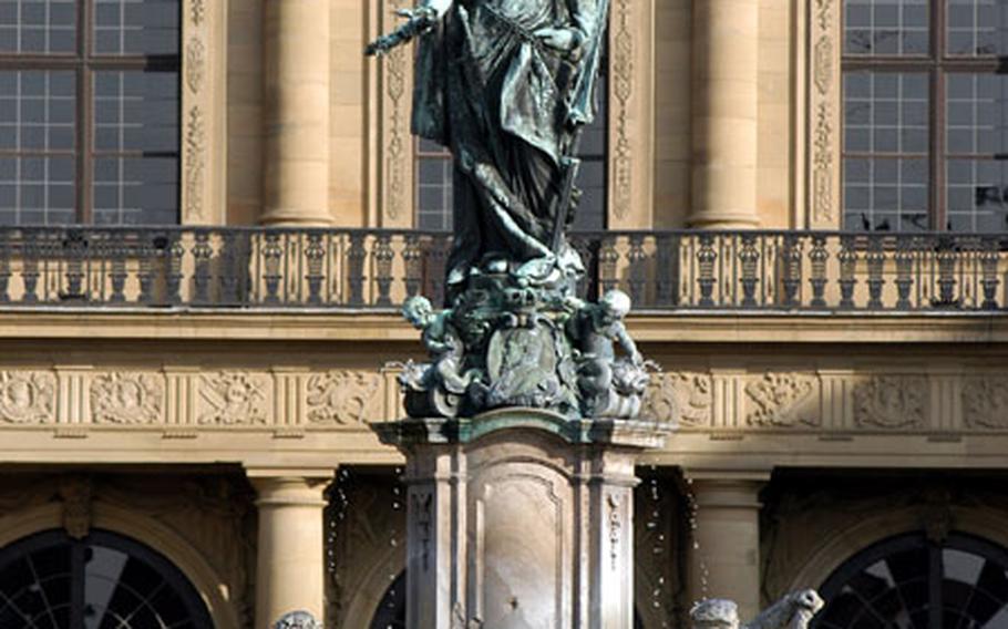 The Franconia Fountain in front of the west facade of the Residenz in Würzburg.