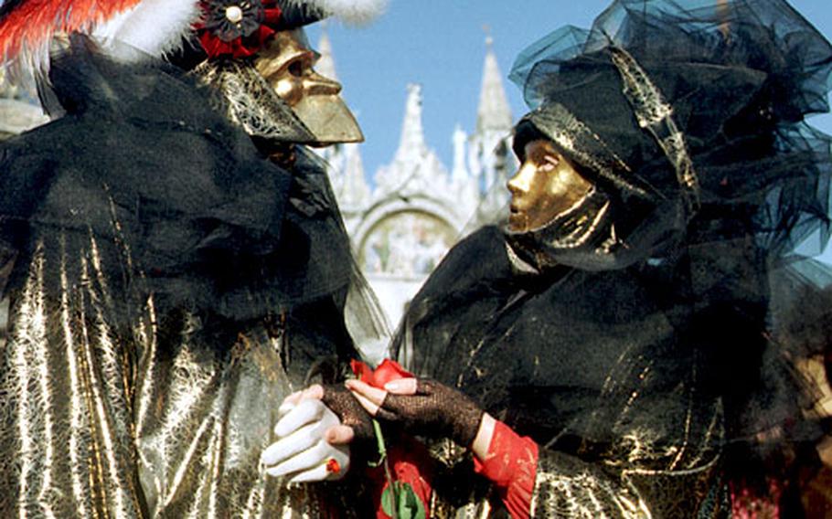 All dressed up in Carnival regalia on St. Mark&#39;s Square in Venice.
