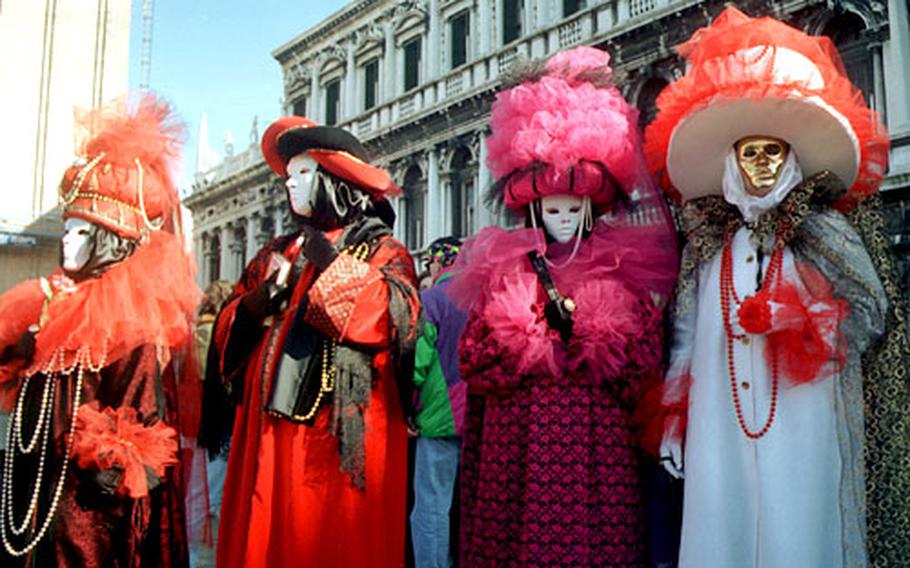 Revelers on St. Mark&#39;s Square in Venice.