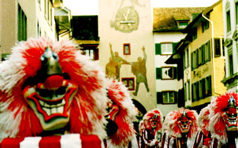 A Fasnacht parade with drummers and pipers takes place in Liestal before the “Chienbäse,” the traditional fire parade that starts at 7 p.m.