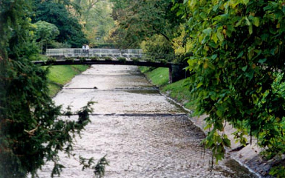 The gentle waters of the River Oos flow through the Lichtentaler Allée park of ancient oaks, magnolias and ornamental shrubs.