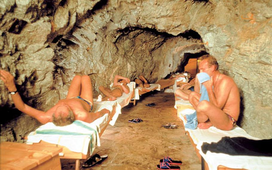 The tunnels in the Heilstollen caves are lined with beds. Those taking in the radon therapy relax (or try to) in sweltering temperatures that open pores so the radon can be absorbed.