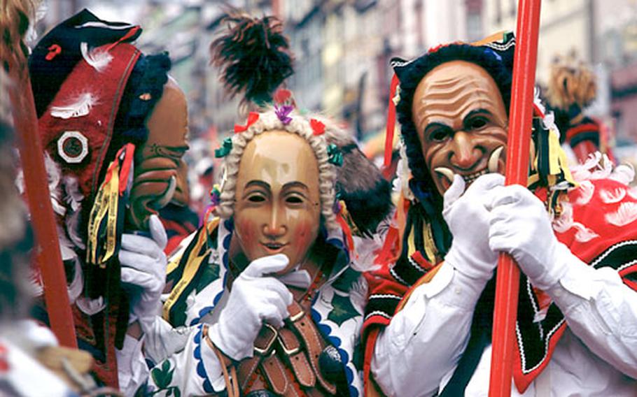 In Rottweil, Germany, playful demons behind wooden masks march through the streets during the Narrensprung, or “Fool’s Jump.”