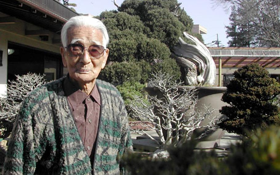 Saburo Kato, 89-year-old chairman of Japan Bonsai Association, at his Mansei-en Bonsai garden in the Bonsai Village in Omiya, Saitama Prefecture.