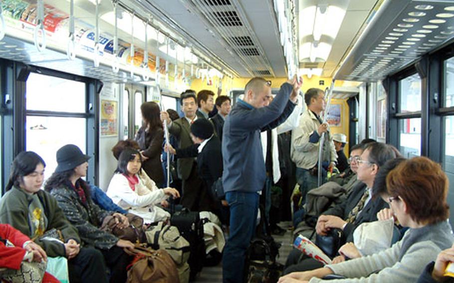 Miss the subways of New York or D.C.? Then try Okinawa’s Yui Rail monorail line at rush hour.
