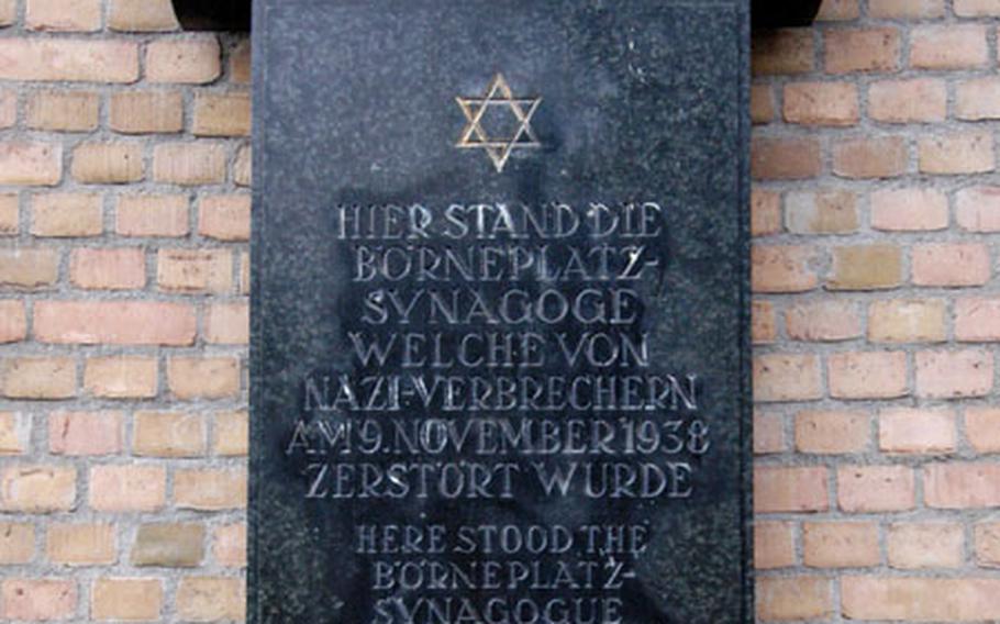 A plaque on the wall of the Frankfurt municipal utilities company marks where the Börneplatz synagogue once stood. It was destroyed during the pogrom of November 1938.