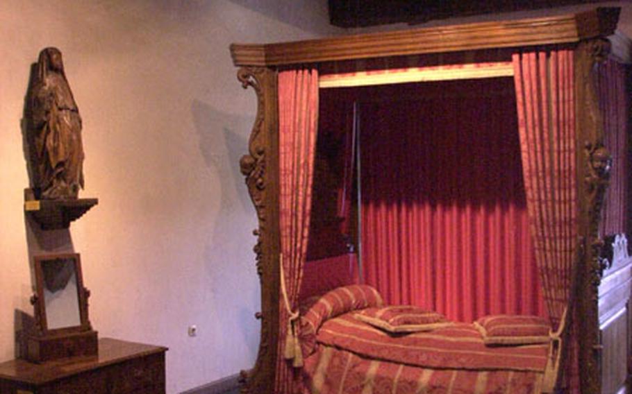 All of Vianden castle&#39;s furnishings were sold by a local entrepreneur, who bought the castle in 1820, then sold it for salvage. This 17th century Baldachin bed came from Dijon, France, and was purchased by the organization that runs the castle.