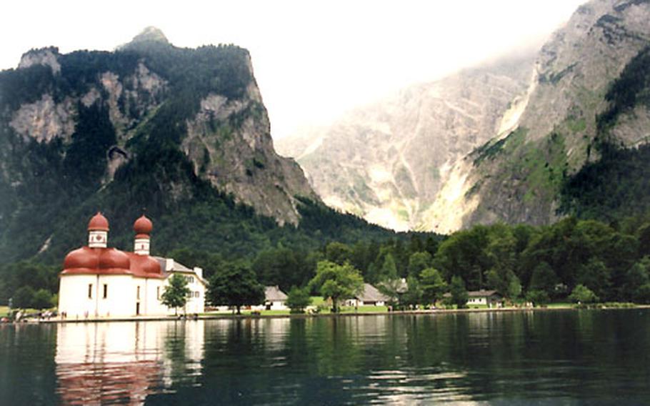 Boat trips on the Königsee make a stop at St. Bartholomä with its onion-domed church.