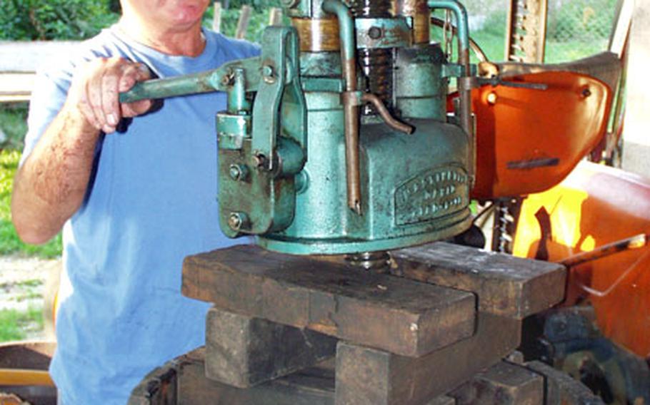 Bepi Del Bosco pumps the wine press that sits in a shed on his ranch in San Quirino, Italy. Del Bosco produces wine from his own vineyard and keeps his family supplied with enough to last until the next harvest.