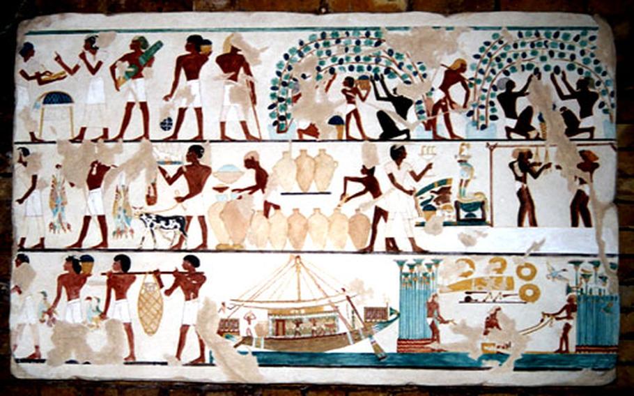 A wall painting shows winemaking in ancient Egypt in a section of Vinopolis called the Cradle of Wine. Exhibits here trace the history of winemaking.
