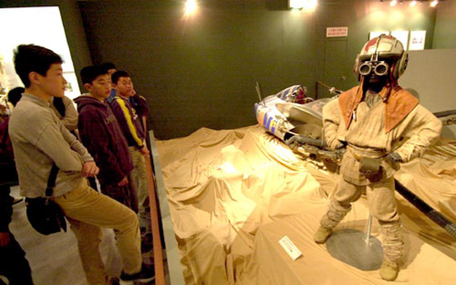 Enjoy Anakin Skywalker’s costume standing in front of the pod racer from “The Phantom Menace.”