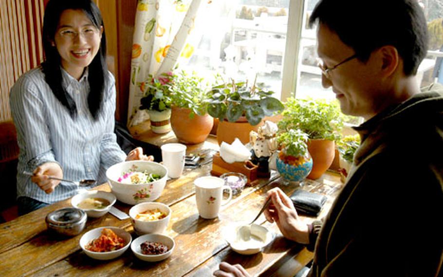 Visitors to Herb Island enjoy a lunch of a special bibimbap made from fresh herbs grown in the area’s garden.