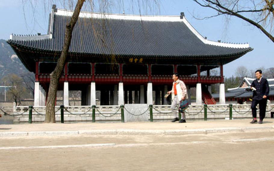 One of the more serene structures on the grounds of the palace is Gyeonghoeru, surrounded by a pond lined with trees.