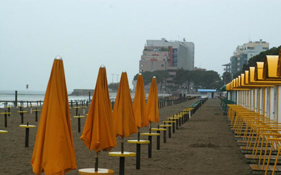 The umbrellas and changing rooms on the main beach in Grado, Italy, are pretty lonely in early May, especially when it&#39;s raining. But the tourist season starts in a few weeks and by midsummer the beach will be full of people.