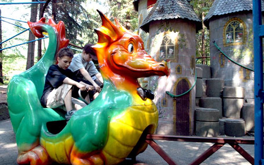 Kids peddle the magic dragon around the castle at the Märchen Paradies.