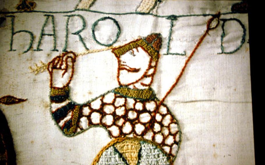 Detail of a portion of the 230-foot-long Bayeux tapestry shows the moment of the death of King Harold in the Battle of Hastings in 1002.