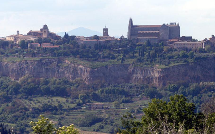 The medieval Italian town of Orvieto perches high atop a craggy cliff.