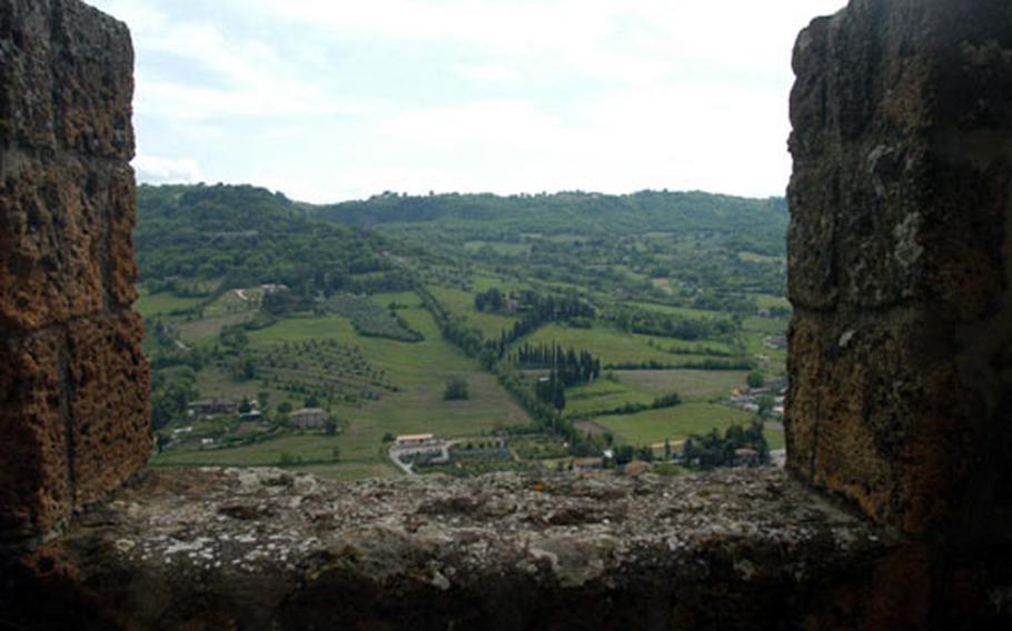 The medieval Italian town of Orvieto, which rests high atop a craggy cliff, offers stunning views such as this of the surrounding countryside.