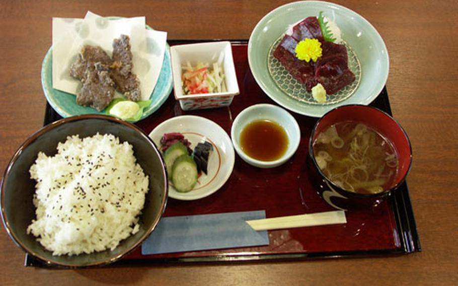 A lunch dish at Yushin — Asakusa&#39;s whale-meat shop and restaurant. Top left: fried whale meat, right: sashimi.