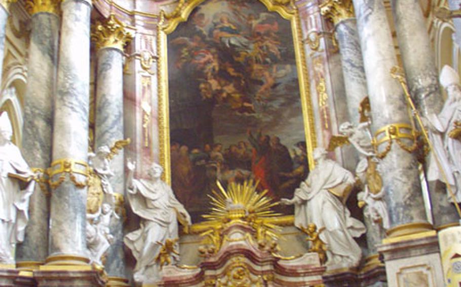 Although the Ebrach Abbey Church is of Gothic architecture, the altars date from the Baroque and neoclassical periods of the 17th and 18th centuries and are resplendent with marble and gold leaf.