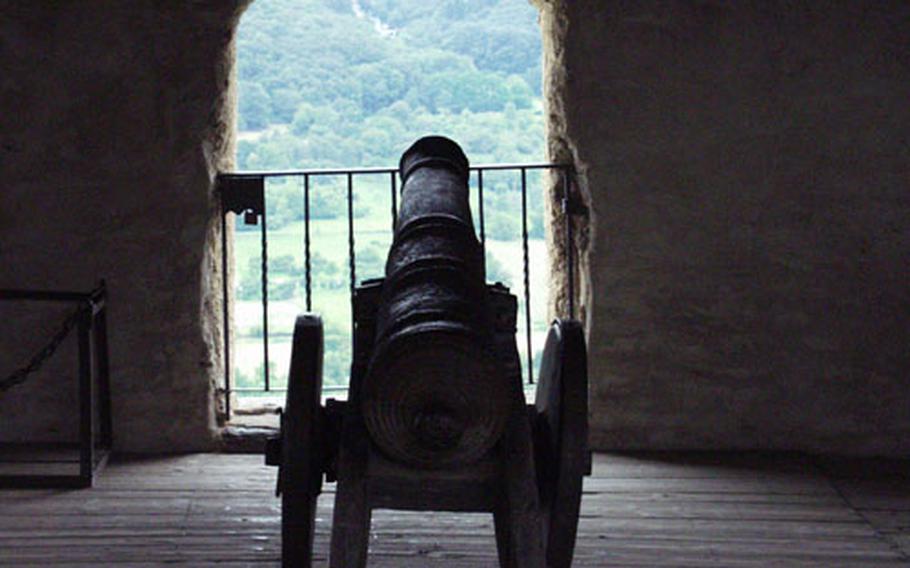 A well-rusted 17th century gun guards the river below Marksburg Castle.