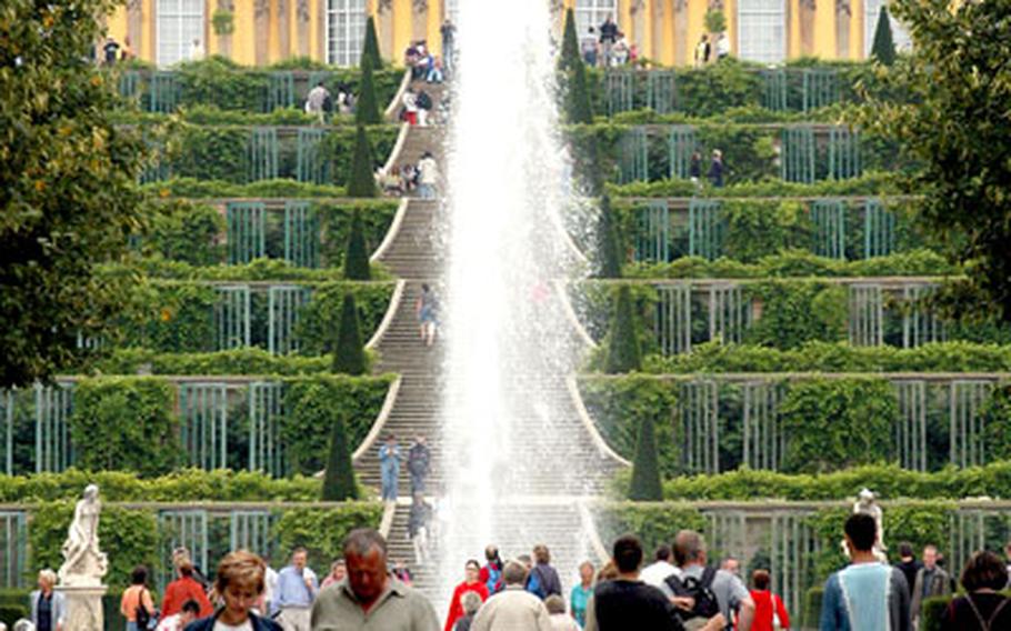 The Lustgarten,with its fountain and the steps and terraces leading up to Schloss Sanssouci.