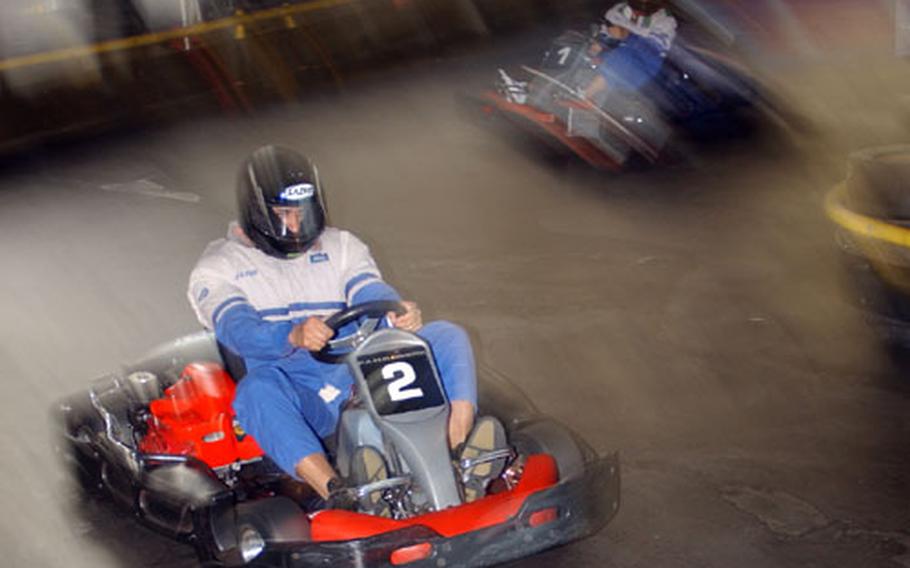 Wannabe Michael Schumachers whip around curves at the Fahr Werk racetrack in Gross-Zimmern, Germany, while transponders record lap times so the fastest drivers are awarded at the end of the race.