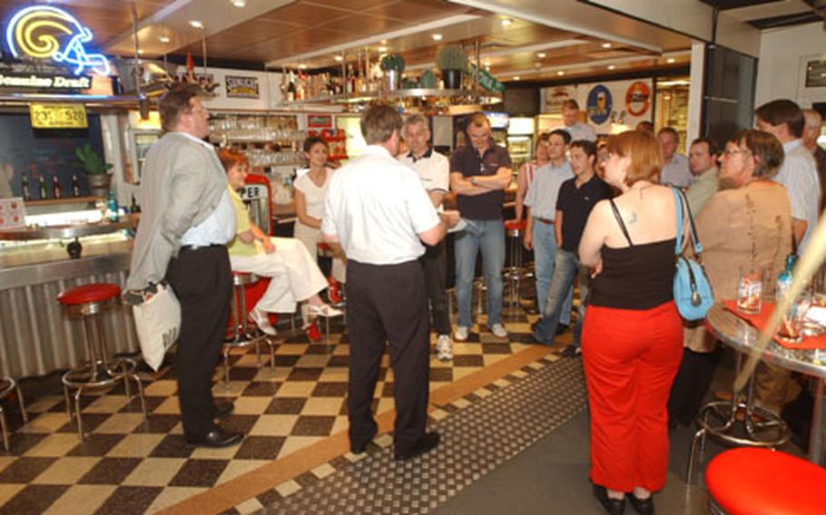 Many groups and organizations use the conference rooms available at Fahr Werk for business sessions before blowing off some steam on the racetrack. Fahr Werk management encourages troops to use the conference rooms for sergeant&#39;s time training and then the track for organization or activity days. Here a group of German workers gathers in the American diner just before the race.