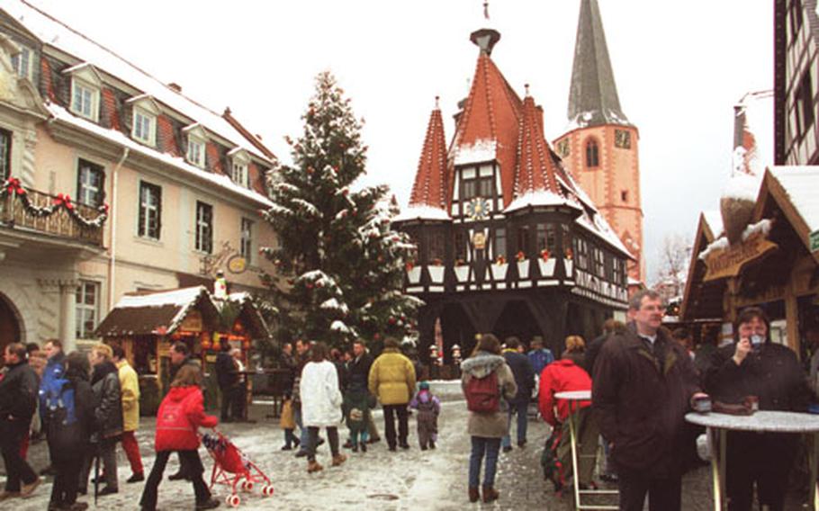The focal point of the Michelstadt, Germany Christmas market is around the town square with its historic town hall.