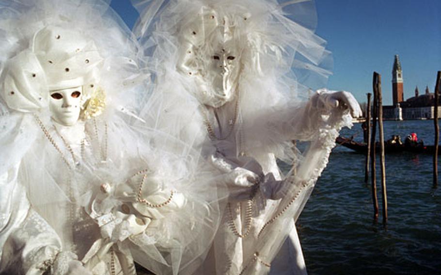 The mysterious and elegant masks of Carnevale in Venice, Italy.