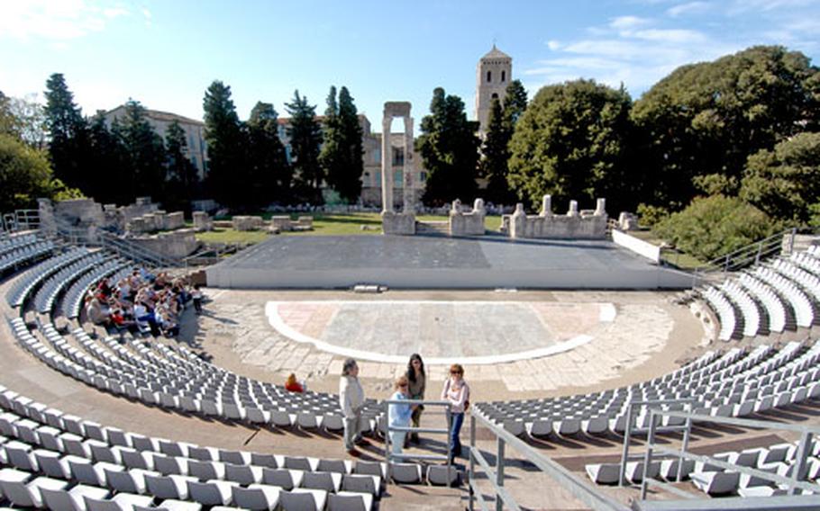 The Roman theater in Arles was built around 215 B.C. It was 335 feet in diameter and could seat 12,000 people. In the summer, theater is still performed here.