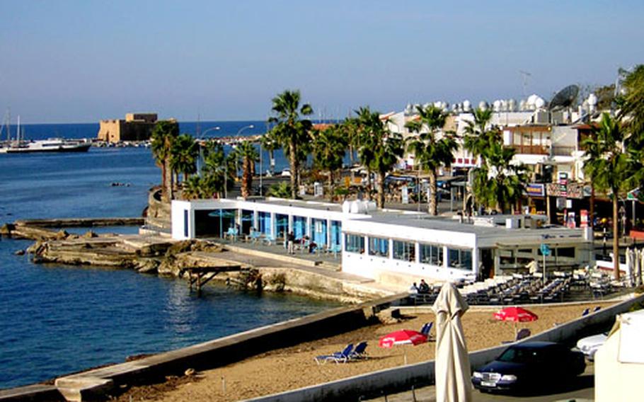 Morning swimmers launch into the winter’s cold water from the bathhouse on the town beach in Paphos, Cyprus.