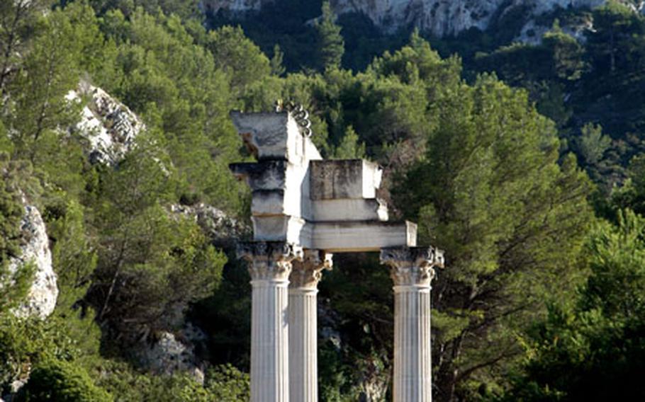The craggy Alpilles tower over Glanum, the archaeological site on the outskirts of St. Rémy, considered the gateway to the region.