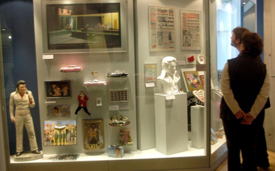 Memorabilia from Elvis Presley&#39;s days in Germany are sprinkled through the "Elvis in Deutschland" exhibit, along with German newspapers reporting the death of Elvis.