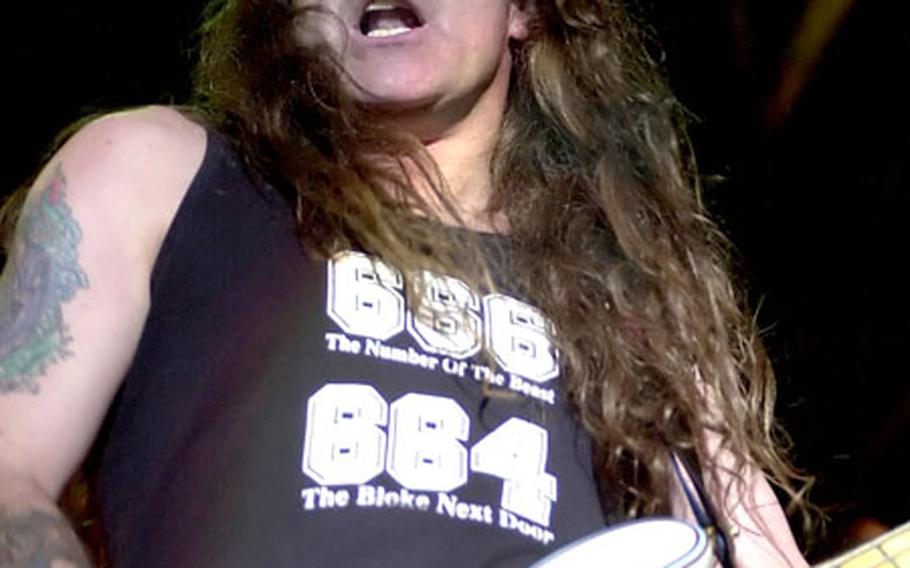 Iron Maiden's Steve Harris pounds some heavy bass lines at a Graspop Metal Mania Festival in Belguim. The band will headline the fest this summer.