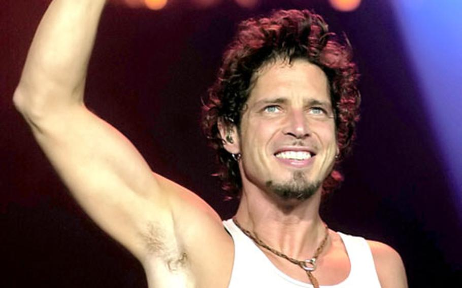 Audioslave&#39;s Chris Cornell waves to the crowd at a Rock-am-Ring fest in Germany.