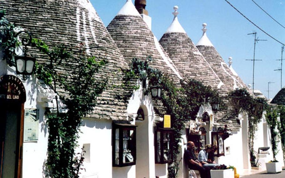 The unusual houses found in parts of Apulia, in Italy’s heel, look like upside-down ice cream cones. The town of Alberobello has some 1,500 of these “Trulli.”