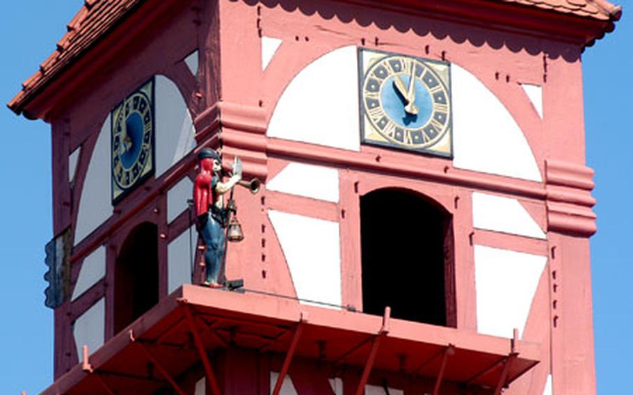 The “Dietemann,” the symbol of Eschwege, Germany, makes his hourly march around the tower of the landgrave palace, where he stops twice to blow his horn.