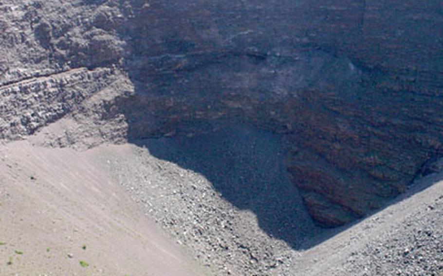 The crater of Mount Vesuvius, which measures about 1½ miles in diameter, provides a spectacular view to reward the challenging climb that visitors endure to reach the summit on foot.