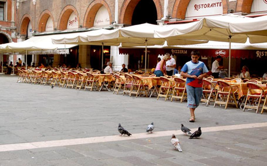 Piazza dei Signori sees far fewer tourists than its counterpart in Venice, St. Mark’s Square. And there’s a lot fewer bird visitors, as well, so this Italian boy only had a handful of pigeons to feed.