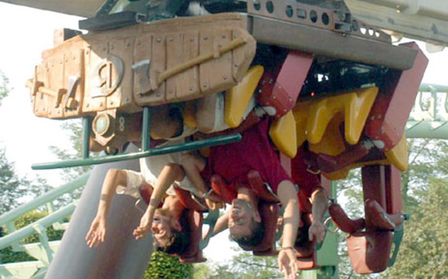 Reaching for the ground, not the sky, on Gardaland&#39;s Sequoia Adventure ride.