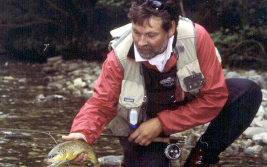 Rudi Heger prepares to return a brown trout caught in the Rote Traun to the river. Heger, owner of Traun River Products GmbH, is one of Europe’s most famous fly-fishing personalities. He attended college in California and has fished many North American rivers.