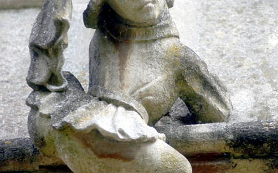 This figure of a boy climbing to the roof of St. Mary’s Church is one of the delightful details to be found at the church.