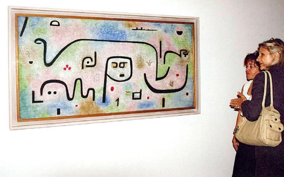 Visitors admire one of Paul Klee&#39;s paintings in the new $86 million Paul Klee Center.