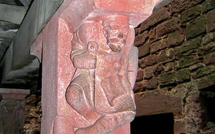 Much of the research and design for the restoration of Haut-Koenigsbourg was by architect Bodo Ebhardt. A carving of Ebhardt is show on one of the pillars that supported a cover for a well inside the fortress.