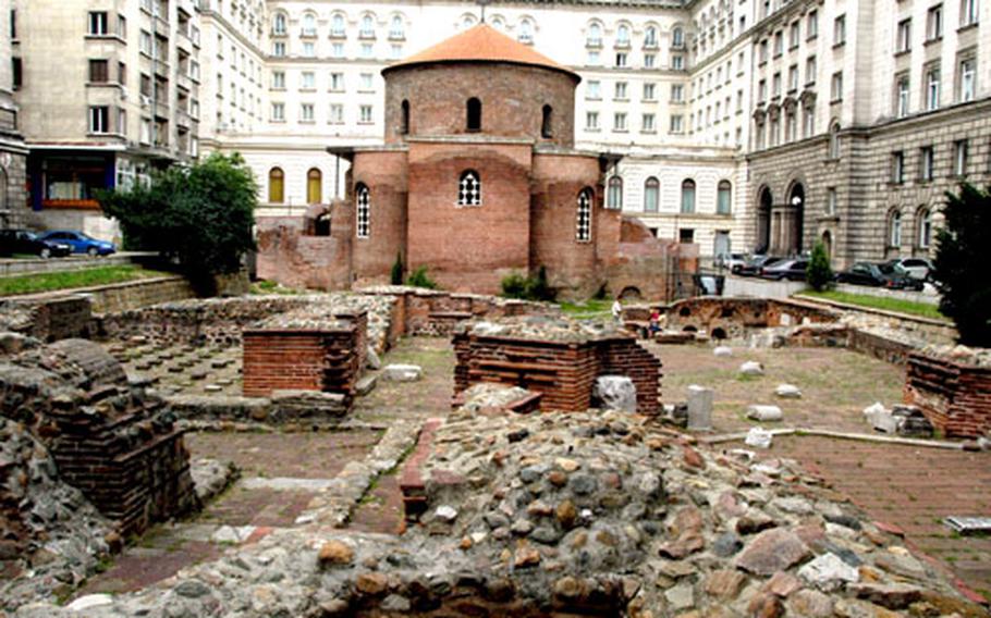 The St. George church, built in the fourth century, is believed to be the oldest building in Sofia, creating a juxtaposition with the modern Sheraton Hotel that lies behind it. Ruins of the ancient city of Serdica are scattered throughout the modern capital.