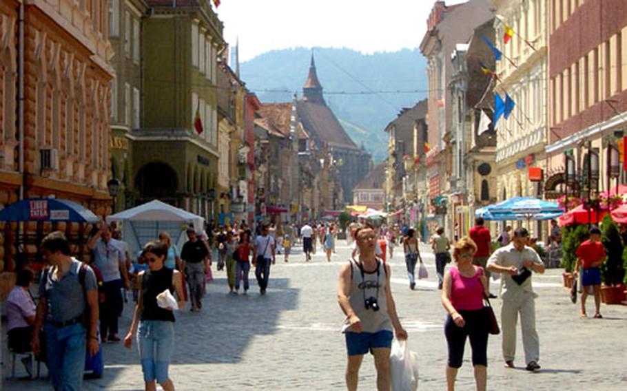 The main pedestrian street in Brasov features an Old World atmosphere.