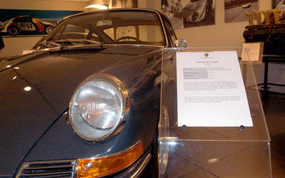 Placards like this one tell visitors to museum that the 1964 911 Coupe was the first in the legendary "911" series.