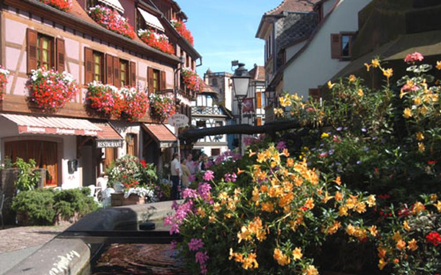 Colorful, flower-filled Ribeauvillé, one of the beautiful towns on the Alsatian Wine Road.